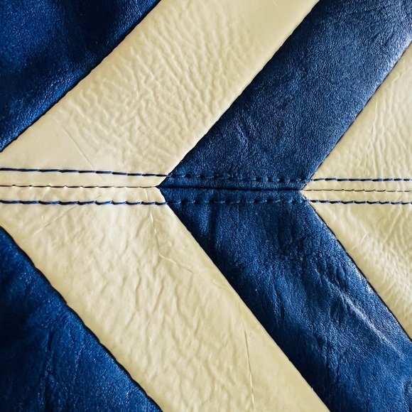 Blue and cream clutch with vibrant yellow interior lining. Button closure - Picture 2 of 8